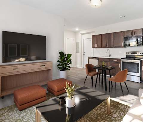 a living room with a couch and a table and a kitchen