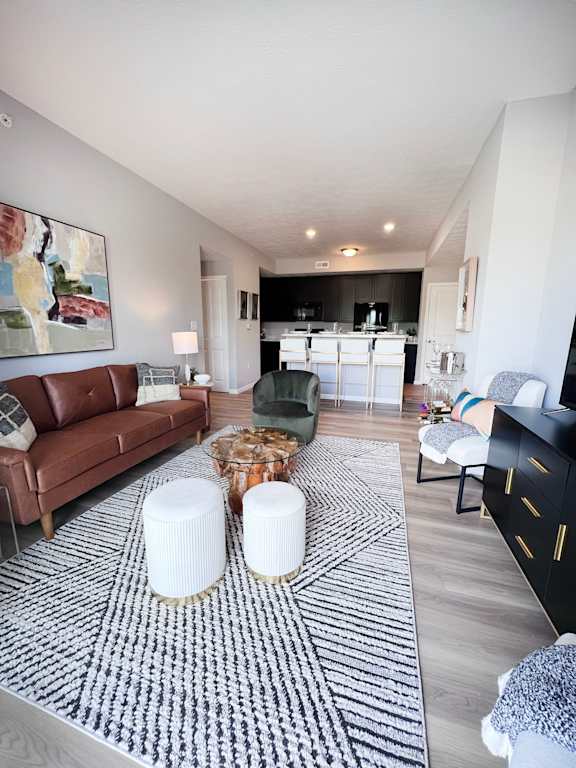 a living room with a couch and a table at Parkway Trails, Florence, KY, 41042