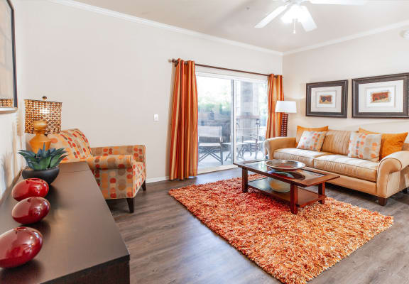 Living Room With Plenty Of Natural Lights at Indigo CreekÂ Apartments, Thornton, CO