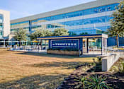 Thumbnail 21 of 24 - A large building with the name "TENNYSON" on it.