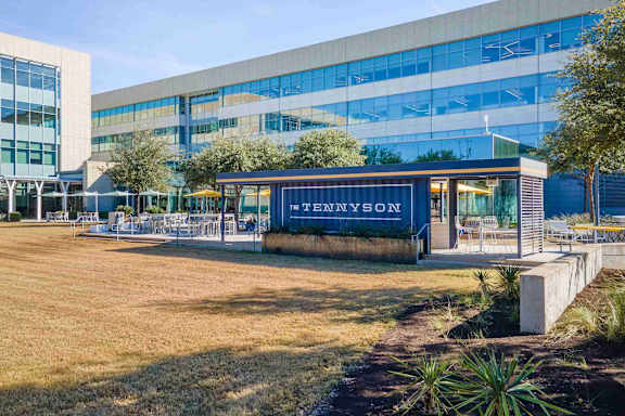 A large building with the name "TENNYSON" on it.