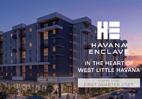 A modern building with the text "Havana Enclave" on it.