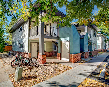 a home with a bike parked in front of it