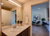 Thumbnail 20 of 31 - Bathroom vanity at Commons at Sylvan Canyon Apartments, Oregon
