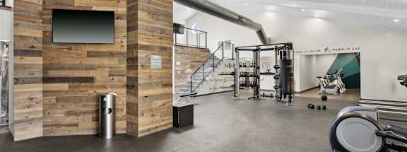 the gym at the flats at big tex apartments