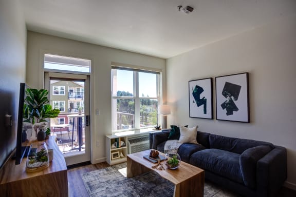 Living with couch at Commons at Sylvan Canyon Apartments, Portland, OR, 97221