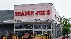 A Trader Joe's store is shown with yellow bollards in front.