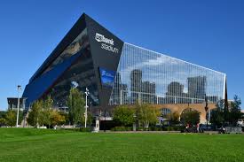 A large stadium with a glass facade and the words "Bank of Scotland Stadium" on it.