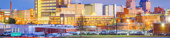 a view of the city at night at Capital Flats & Magnolia Square Apartments, North Carolina, 27601