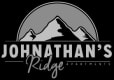 a logo for johannes ride with a mountain in the background