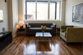 Model Unit living room and hardwood floors