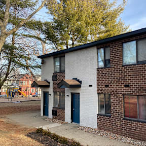 a brick building with a 4 on the side of it