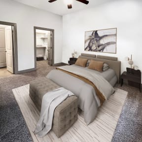 a bedroom with white walls and gray carpet