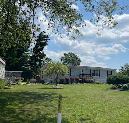 a house with a lawn in front of it
