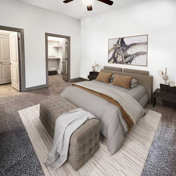 a bedroom with white walls and gray carpet