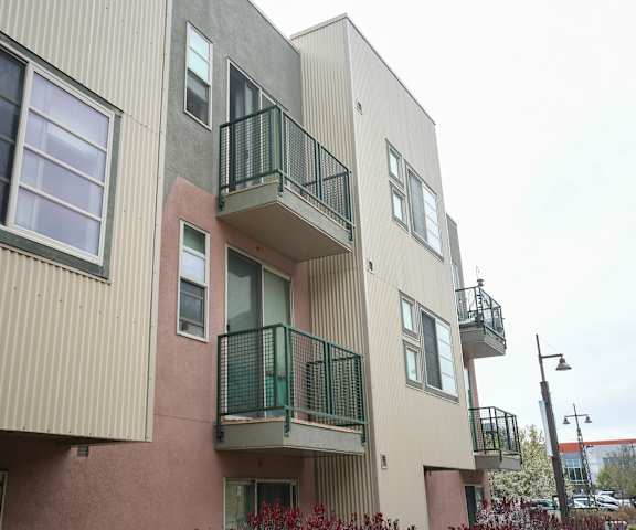 an image of an apartment building with balconies