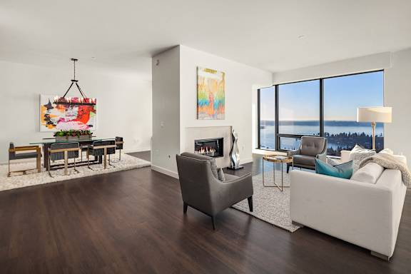a living room with a couch and chairs and a fireplace at Two Lincoln Tower Apartments, Bellevue, WA, 98004