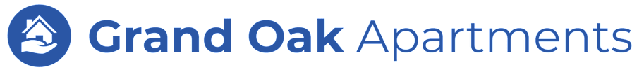 The image is a logo of Grand Oak Apartments.