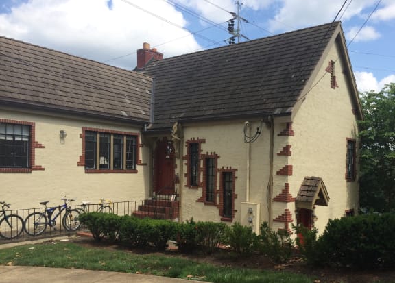 a house with bikes parked outside of it