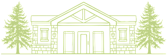 A green house with trees in front.
