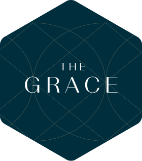 a logo for the grape with a blue and white grid on it