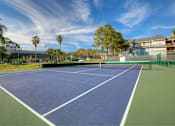 Thumbnail 17 of 24 - The tennis court offers a sweet spot for a game.