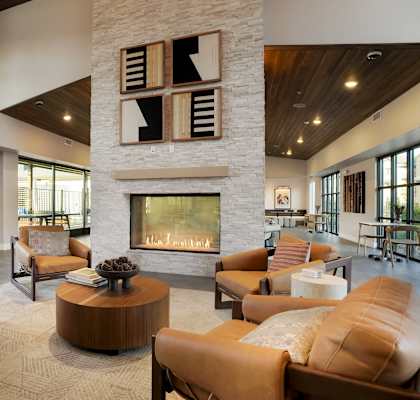 A living room with a fireplace and a couch.