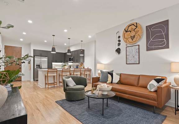 a living room with a couch and a table