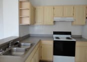 Thumbnail 14 of 28 - Interior Unit Kitchen Sink Counter Cabinets Stove Allegro Palms Riverview Florida