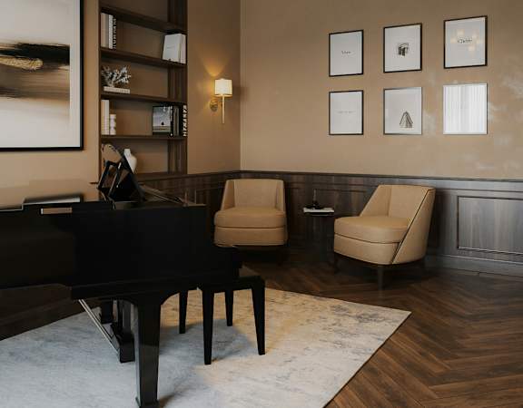 A living room with a piano, chairs, and pictures on the wall.