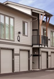 a row of garages at the whispering winds apartments in pearland, tx