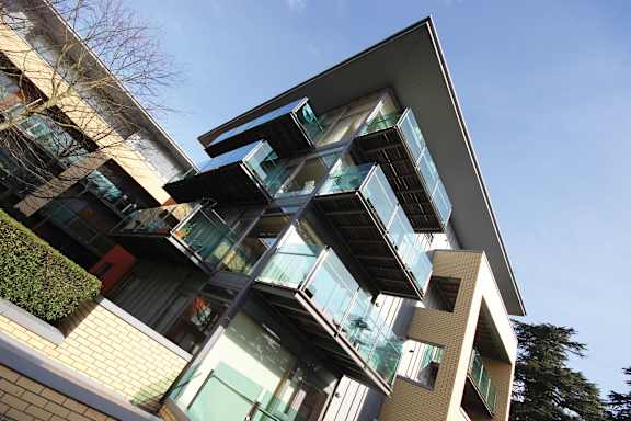a building with windows and a blue sky