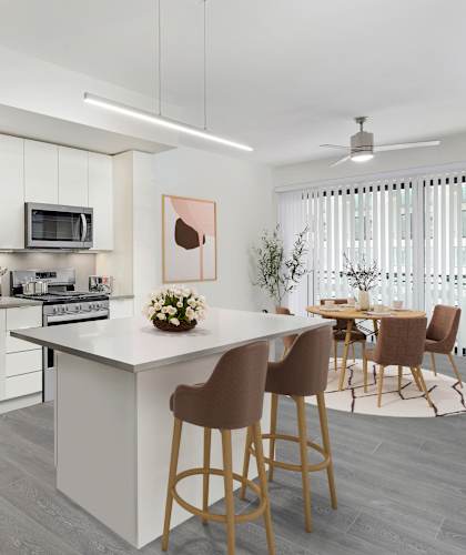 a kitchen and dining area in a 555 waverly unit at The Deco at 5211, Atlanta, Georgia