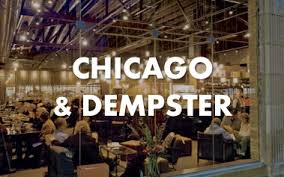 A large room with the words "Chicago & Dempster" displayed on the screen.