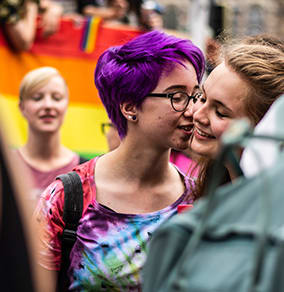 Love is love.  Two people embracing.  Uptown Chicago.