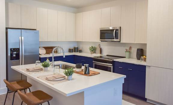 Charming kitchen design at The Maven, Suwanee