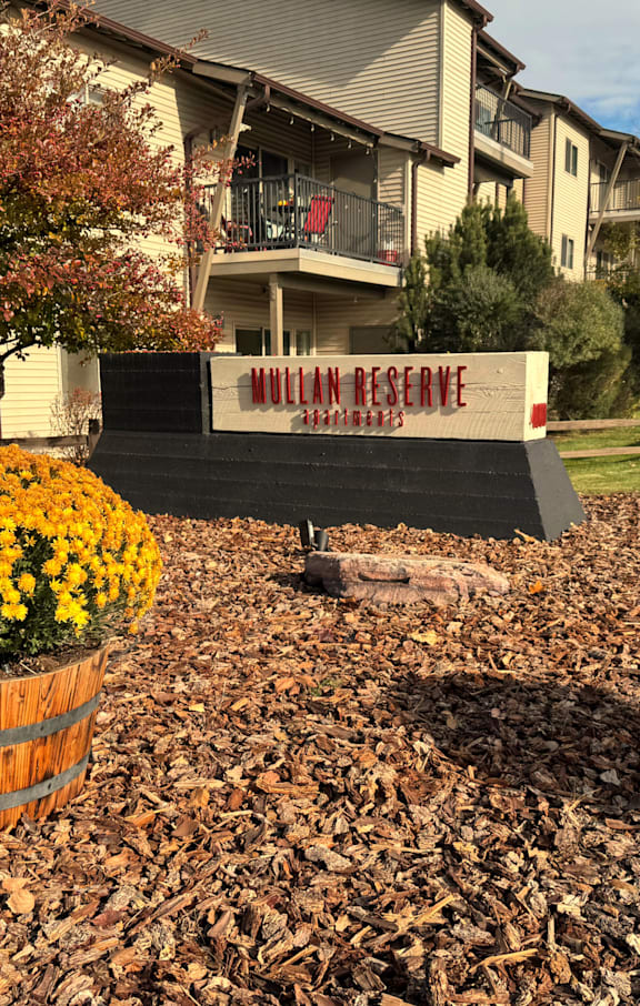 a large sign with the words human resource development on it in front of a tree Mullan Reserve Apartments, Missoula, MT 59808