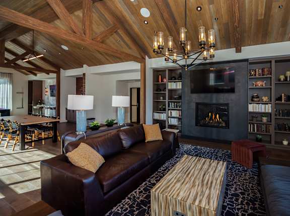 A living room with a fireplace and a couch.