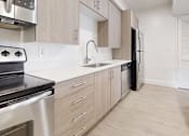 Thumbnail 9 of 23 - Well Organised Kitchen at Avia Lofts at Maple Road, Amherst, 14221