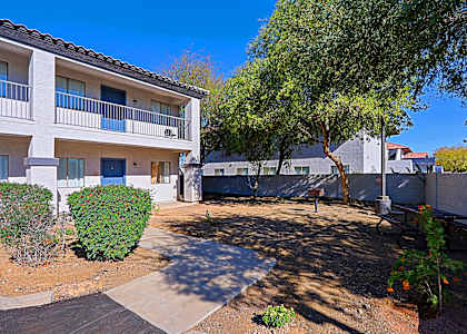 A sunny day at the courtyard of a residential building.