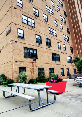 a large room with tables and chairs | Lancaster House North | Apartments in Lancaster