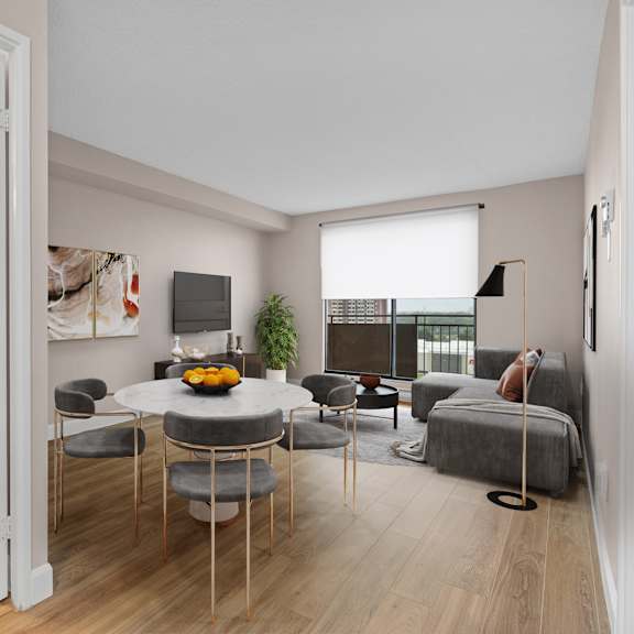 A modern living room with a dining table and chairs.