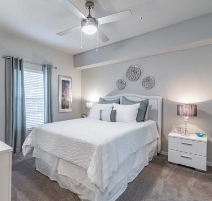 Bedroom With Expansive Windows at Portofino Apartment Homes, Tampa