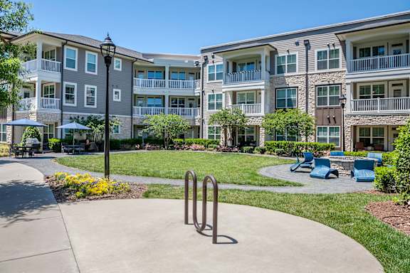 Grill and Firepit area at The Flats at Ballantyne Apartments, Charlotte, North Carolina