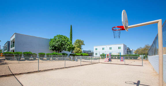 A basketball court with a basketball hoop and a net.