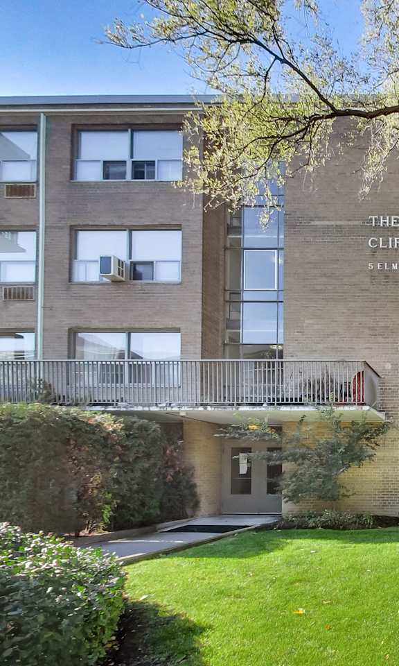 The Clifton Film Archive building with a tree in front.