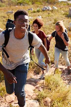 Group of friends hiking together at Brea Grove Residences Apartments, Brea