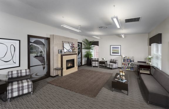 lobby of apartment building with large fireplace