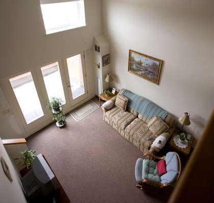 an overhead view of a living room with a couch