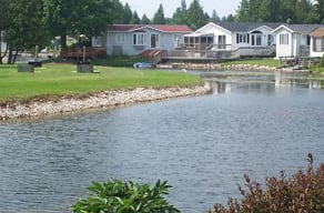 Residential buildings near a park and body of water